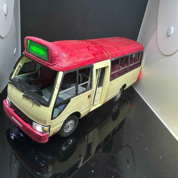Red 3D minibus